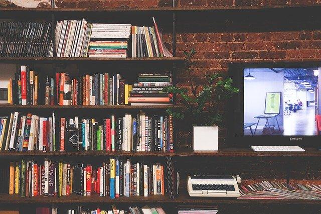 TV amongst bookshelves